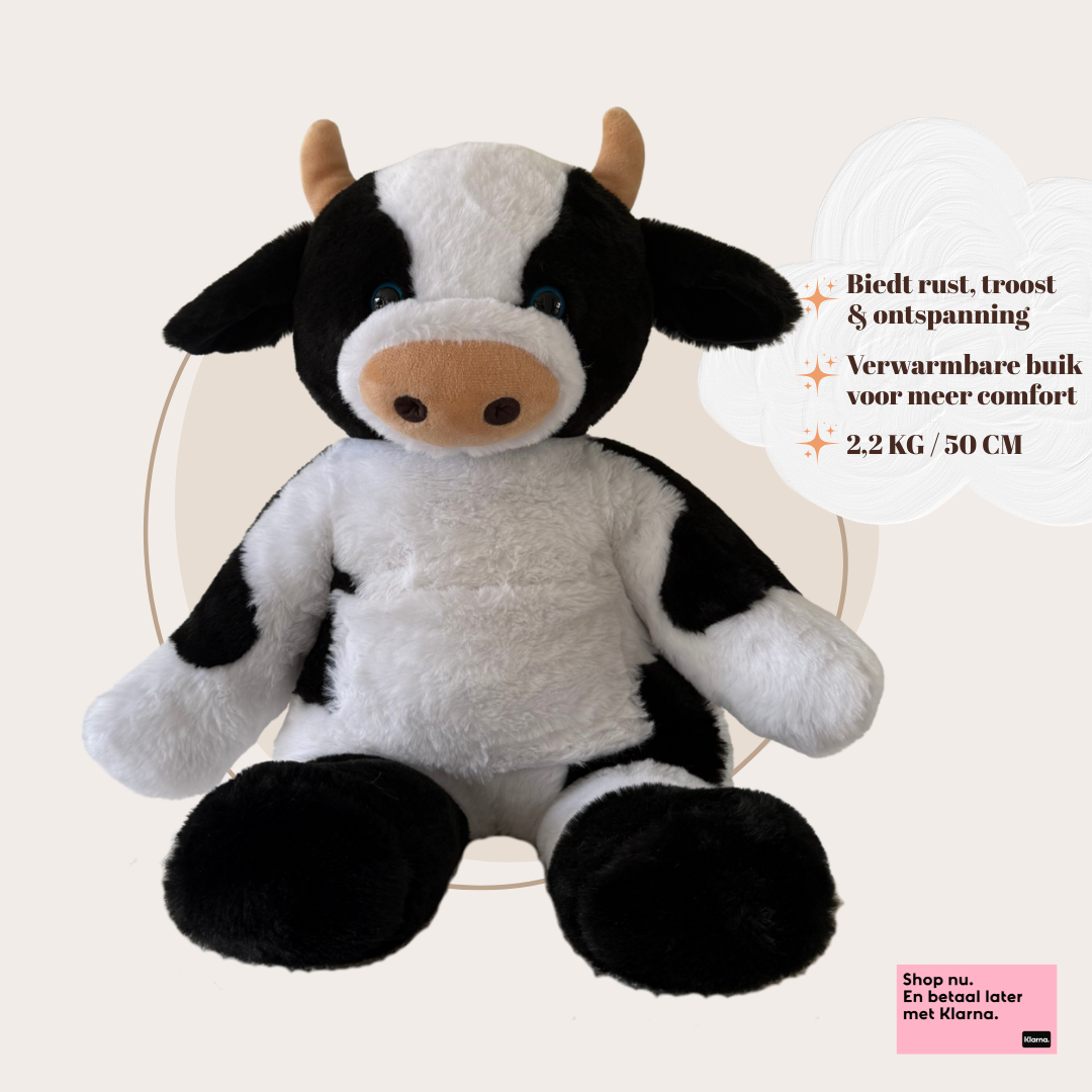 Troostmaatje: zachte zwart-witte verzwaringsknuffel koe van 2,2 kg met warmbare buik voor diepe ontspanning.